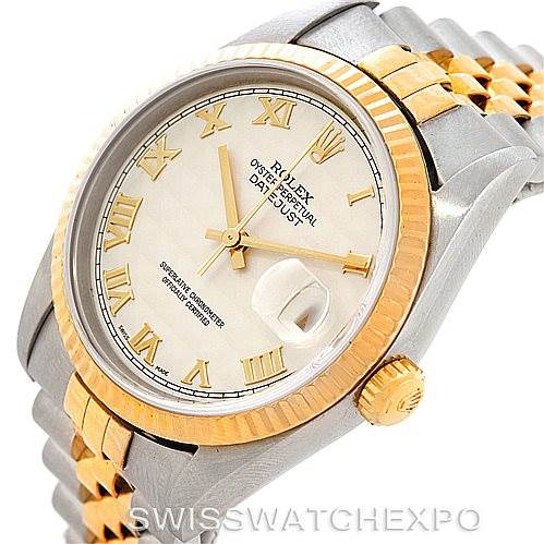 The Rolex Datejust 16233 Men
s Steel and Gold (two tone) Beige Dial 16233 Men
s Steel and Gold (two tone) Beige Dial watch is shown at an angle displaying the dial, bezel, and part of the bracelet, highlighting its two-tone design.