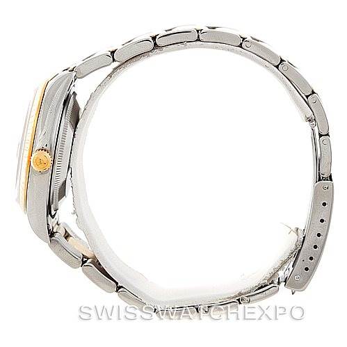 The image shows a side profile view of a Rolex Datejust 15223 Men's Steel and Gold (two tone) Black Dial 15223 Men's Steel and Gold (two tone) Black Dial watch, highlighting its case, crown, and bracelet.