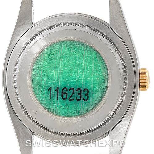 The image shows the case back and part of the lugs of a Rolex Datejust 116233 Men's Stainless Steel Blue Dial 116233 Men's Stainless Steel Blue Dial watch, with the model number visible.