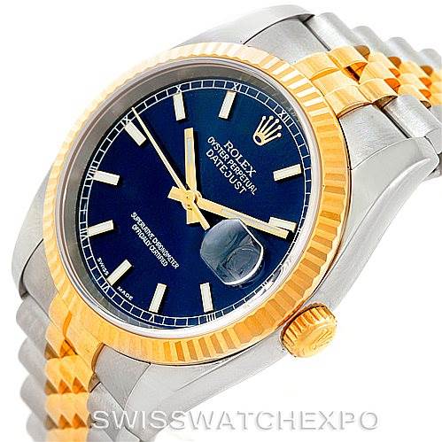 This image shows the Rolex Datejust 116233 Men's Stainless Steel Blue Dial 116233 Men's Stainless Steel Blue Dial watch from an angled top view, highlighting the dial, fluted bezel, crown, and two-tone bracelet.