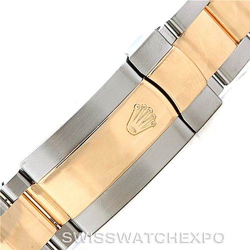 The image shows a close-up of the clasp and bracelet of a Rolex Datejust 116233 Men's Stainless Steel White Dial 116233 Men's Stainless Steel White Dial watch, featuring a two-tone design with the Rolex logo.