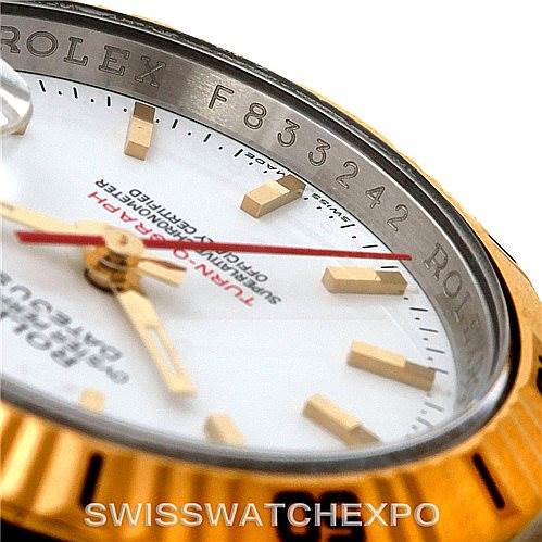 This image shows a close-up of the dial and bezel of a Rolex Datejust 116263 Men's Stainless Steel White Dial 116263 Men's Stainless Steel White Dial watch, highlighting the lettering, hour markers, and the edge of the fluted bezel.