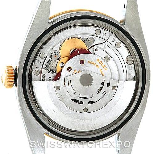 This image shows the movement and inner mechanism of a Rolex Datejust 116263 Men's Stainless Steel White Dial 116263 Men's Stainless Steel White Dial watch from a back angle with the case back removed.