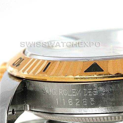 The image shows a close-up of the Rolex Datejust 116263 Men's Stainless Steel White Dial 116263 Men's Stainless Steel White Dial model, focusing on the two-tone bezel and the engravings on the case.