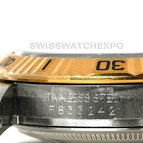 The image shows a close-up of the side of a Rolex Datejust 116263 Men's Stainless Steel White Dial 116263 Men's Stainless Steel White Dial watch, highlighting its stainless steel case and a portion of the bezel.