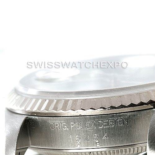The image shows a close-up angle of the side bezel, crystal, and case of a Rolex Datejust 16234 Men's Stainless Steel Black Dial 16234 Men's Stainless Steel Black Dial watch, with the model number "16234" engraved on the case.