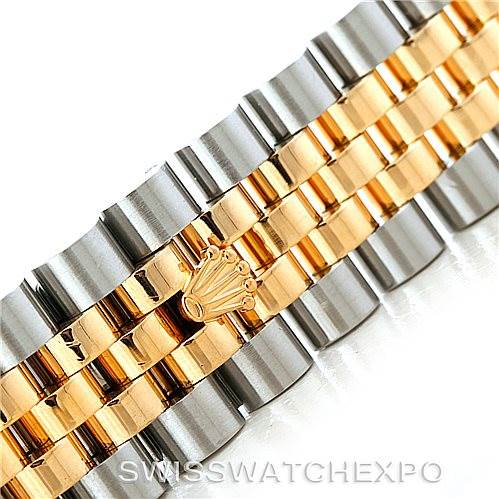 This image shows a close-up of the two-tone Jubilee bracelet of a Rolex Datejust 116233 Men
s Stainless Steel Champagne Dial 116233 Men
s Stainless Steel Champagne Dial watch.