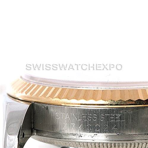 This image shows a side view of the bezel and case side of a Rolex Datejust 116233 Men
s Stainless Steel Champagne Dial 116233 Men
s Stainless Steel Champagne Dial watch, highlighting the serial number engraving.
