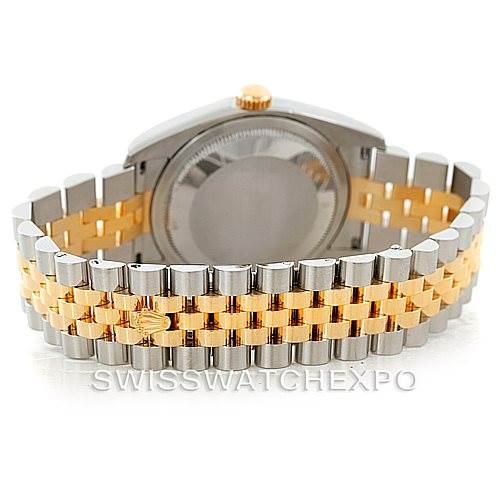 This image shows the back view of a Rolex Datejust 116233 Men
s Stainless Steel Champagne Dial 116233 Men
s Stainless Steel Champagne Dial watch, highlighting its two-tone metal bracelet and case back.