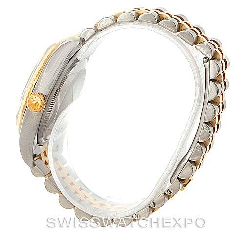 The image shows a side profile of a Rolex Datejust 116233 Men
s Stainless Steel White Dial 116233 Men
s Stainless Steel White Dial watch, highlighting its case, crown, and bracelet.