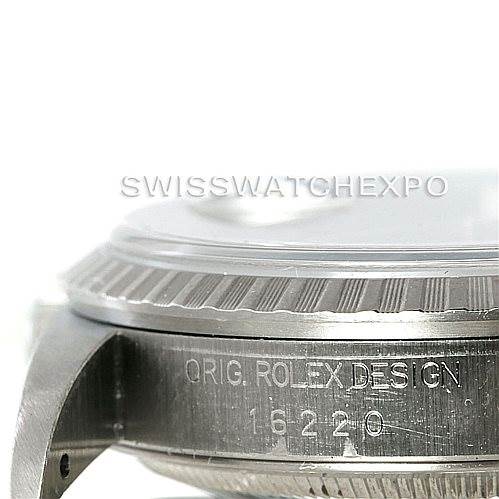 This image shows a close-up of the side of a Rolex Datejust 16220 Men
s Stainless Steel Black Dial 16220 Men
s Stainless Steel Black Dial watch case, featuring the model number 16220 and "ORIG. ROLEX DESIGN" engraving.