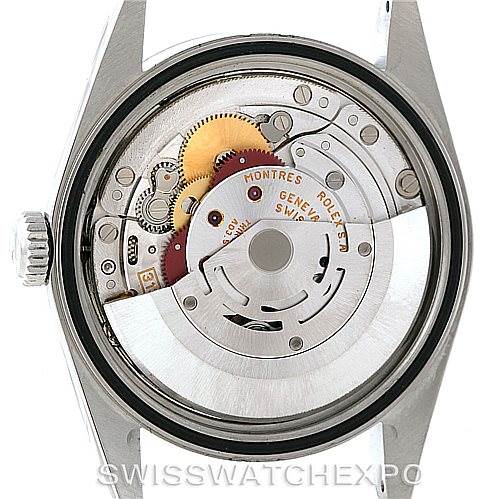 The image shows the open case back of a Rolex Datejust 16220 Men
s Stainless Steel Black Dial 16220 Men
s Stainless Steel Black Dial watch, revealing its intricate internal movement components.