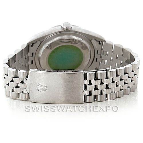 The image shows the back of the Rolex Datejust 16220 Men
s Stainless Steel Black Dial 16220 Men
s Stainless Steel Black Dial watch, highlighting the bracelet and the clasp with the Rolex logo.