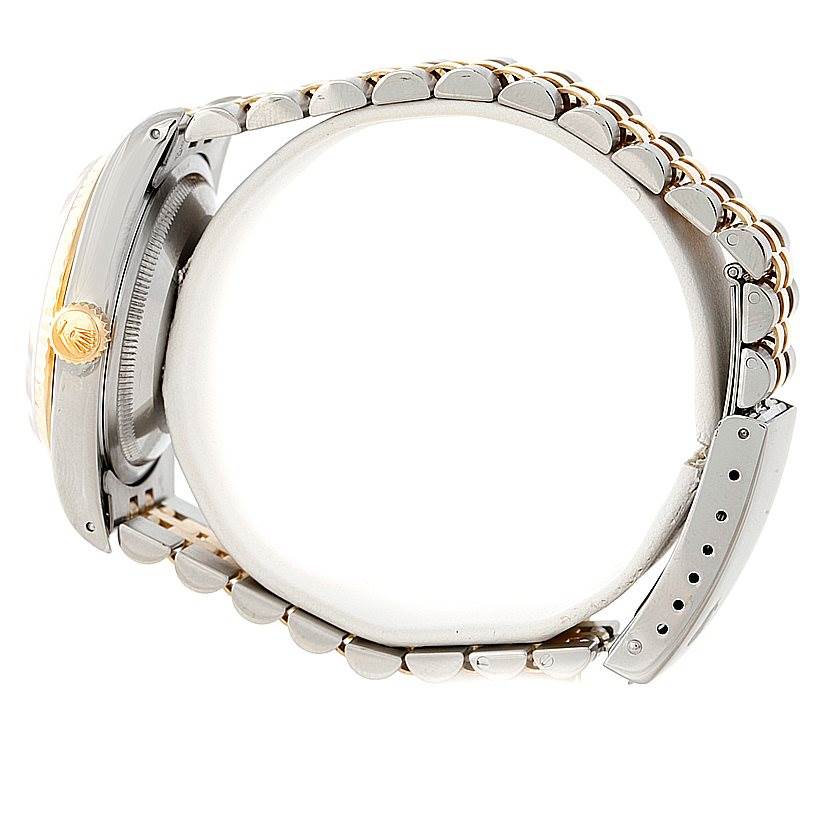 The image shows a Datejust model by Rolex from a side angle, highlighting the case, crown, and part of the bracelet.