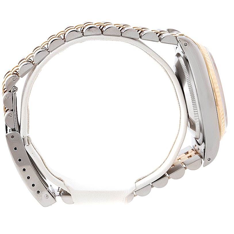 The image shows a side profile of a Rolex Datejust 16233 Men's Steel and Gold (two tone) Beige Dial 16233 Men's Steel and Gold (two tone) Beige Dial watch, focusing on its bracelet and partially visible case and bezel.