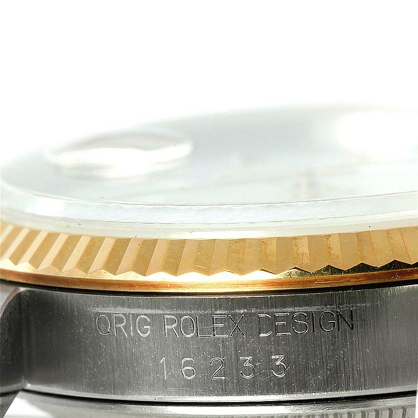 The image shows a close-up side view of the Rolex Datejust 16233 Men's Steel and Gold (two tone) White Dial 16233 Men's Steel and Gold (two tone) White Dial model, focusing on the bezel and case with the model number.