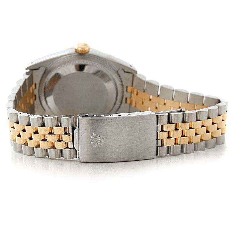 The image shows the back case and clasp of a Rolex Datejust 16233 Men's Steel and Gold (two tone) White Dial 16233 Men's Steel and Gold (two tone) White Dial watch in a stainless steel and gold two-tone design.