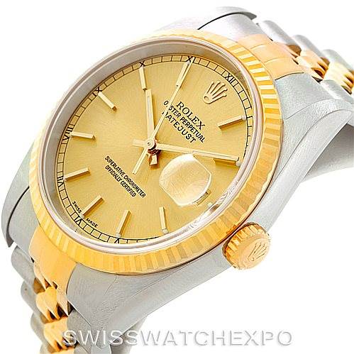 This image features the Rolex Datejust 16233 Men's Steel and Gold (two tone) Champagne Dial 16233 Men's Steel and Gold (two tone) Champagne Dial watch model, showcasing its gold and stainless steel case, fluted bezel, and Jubilee bracelet at an angled view.