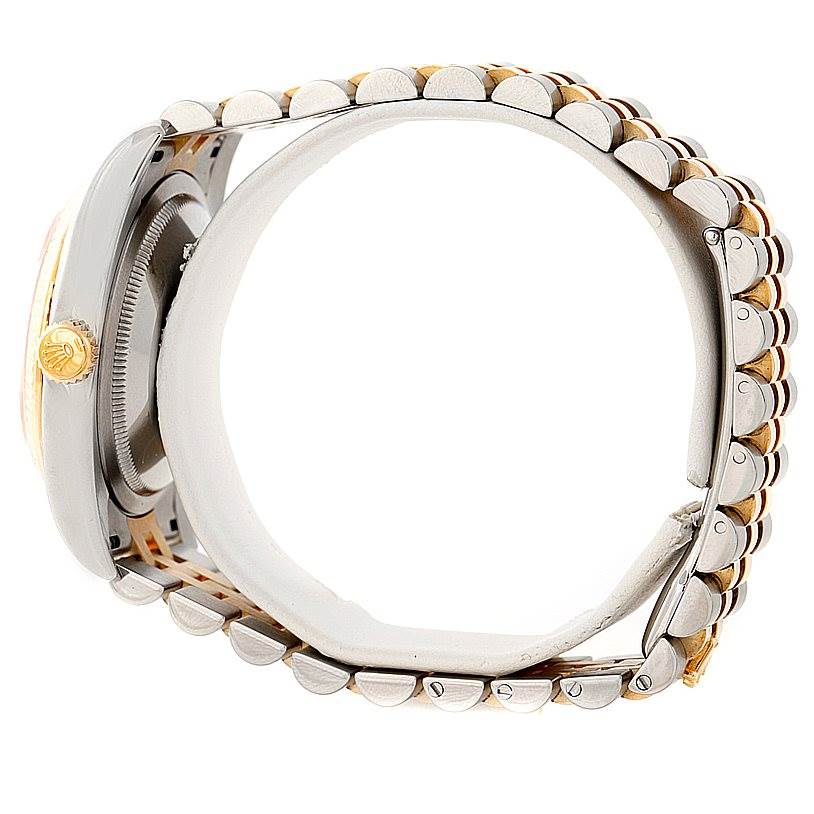 The image shows a side view of the Rolex Datejust 116233 Men
s Stainless Steel Champagne Dial 116233 Men
s Stainless Steel Champagne Dial watch, focusing on the crown and part of the bracelet.