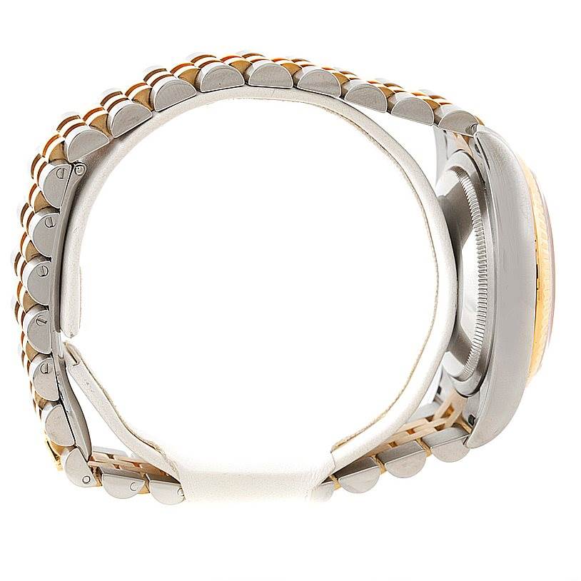 This image shows the side view of a Rolex Datejust 116233 Men
s Stainless Steel Champagne Dial 116233 Men
s Stainless Steel Champagne Dial watch, highlighting the bracelet and side of the case.