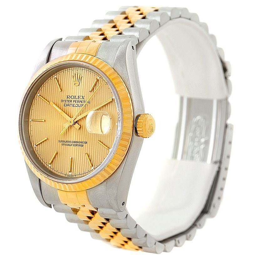 The image shows a side-angle view of a Rolex Datejust 16233 Men's Steel and Gold (two tone) Champagne Dial 16233 Men's Steel and Gold (two tone) Champagne Dial watch, highlighting the gold dial, bezel, crown, and two-tone bracelet.
