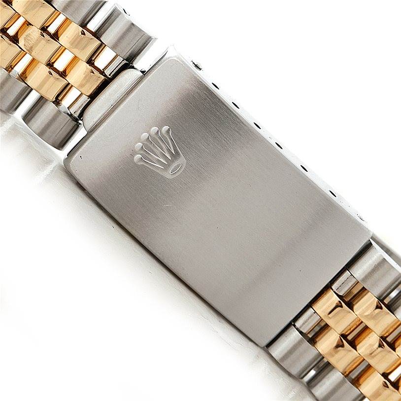 The image shows the clasp and part of the bracelet of the Rolex Datejust 16233 Men's Steel and Gold (two tone) Champagne Dial 16233 Men's Steel and Gold (two tone) Champagne Dial watch, featuring a combination of silver and gold links.