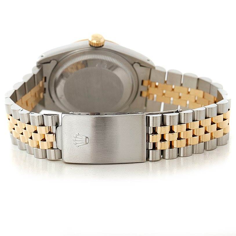 The image shows the back view of a Rolex Datejust 16233 Men's Steel and Gold (two tone) Champagne Dial 16233 Men's Steel and Gold (two tone) Champagne Dial watch, highlighting the bracelet and clasp.