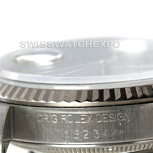 This image of a Rolex Datejust 16234 Men's Stainless Steel Grey Dial 16234 Men's Stainless Steel Grey Dial watch shows a close-up of the side, highlighting the bezel, part of the dial, and the model number "16234."