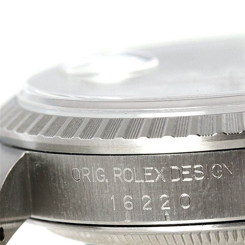 The image shows a close-up of the case and bezel of a Rolex Datejust 16220 Men's Stainless Steel White Dial 16220 Men's Stainless Steel White Dial 16220 model.
