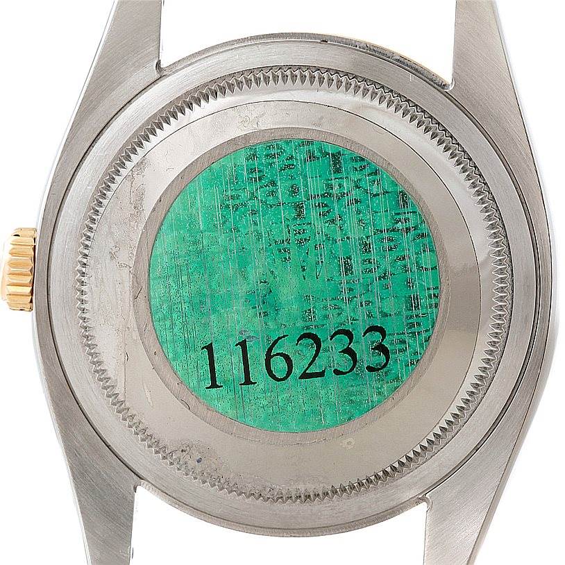 This image shows the back casing of the Rolex Datejust 116233 Men's Stainless Steel Beige Dial 116233 Men's Stainless Steel Beige Dial model watch with the model number 116233 visible.