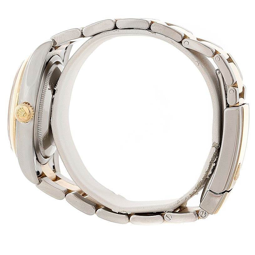 The image shows a side view of the Rolex Datejust 116203 Men's Stainless Steel Mother of Pearl Dial 116203 Men's Stainless Steel Mother of Pearl Dial watch, highlighting its bracelet and crown.