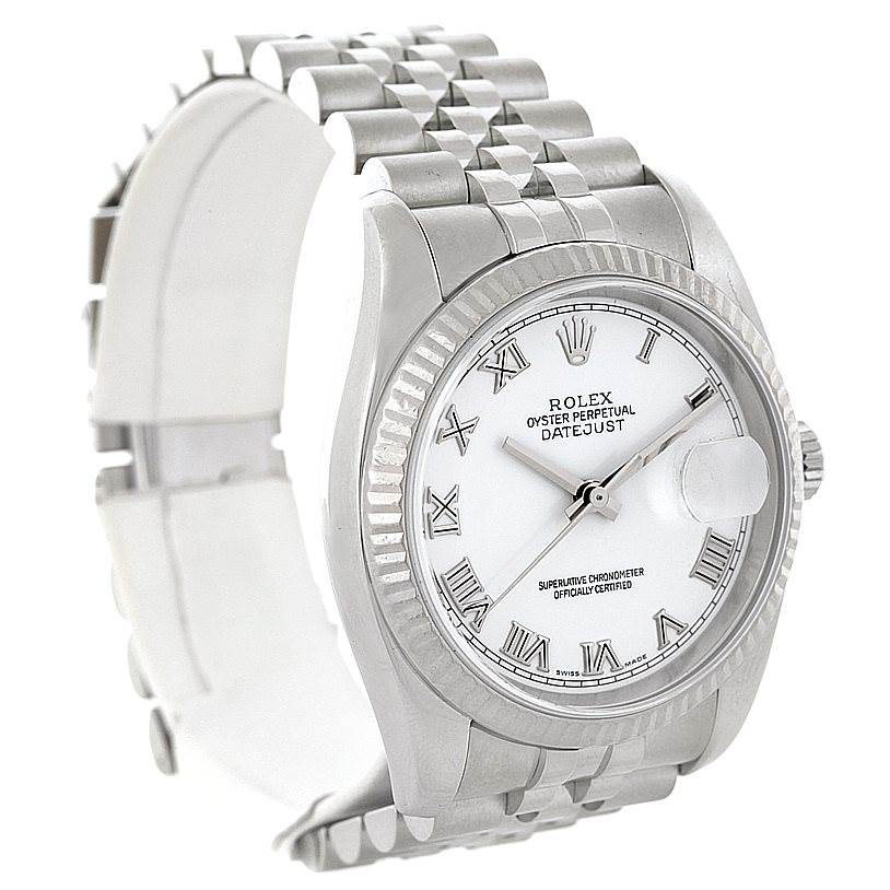 This Rolex Datejust 116234 Men
s Stainless Steel White Dial 116234 Men
s Stainless Steel White Dial watch is shown at a slightly tilted angle, highlighting its face, bezel, and bracelet.