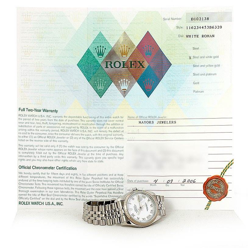 The Rolex Datejust 116234 Men
s Stainless Steel White Dial 116234 Men
s Stainless Steel White Dial watch, shown from a front angle, is displayed lying flat in front of its warranty card.