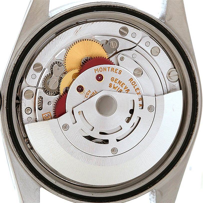 This image shows a view of the movement and inner mechanisms of a Rolex Datejust 16220 Men
s Stainless Steel Black Dial 16220 Men
s Stainless Steel Black Dial watch from the back.