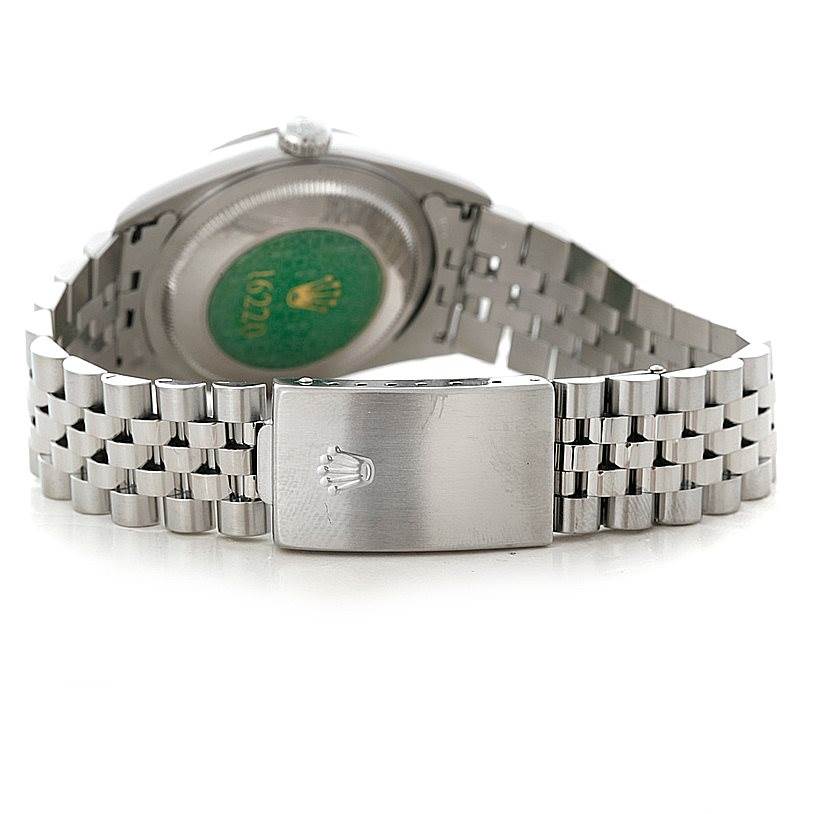 This image shows the back case and bracelet clasp of a Rolex Datejust 16220 Men
s Stainless Steel Black Dial 16220 Men
s Stainless Steel Black Dial watch.