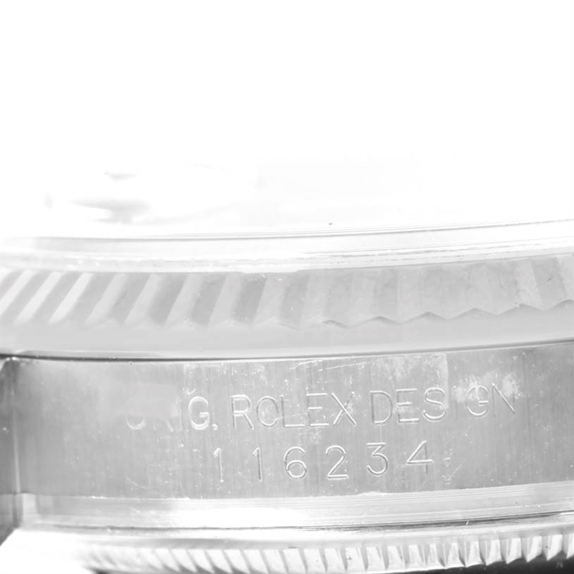 The image shows a side view of the casing, bezel, and serial number engraving on a Rolex Datejust 116234 Men
s Stainless Steel Black Dial 116234 Men
s Stainless Steel Black Dial watch.