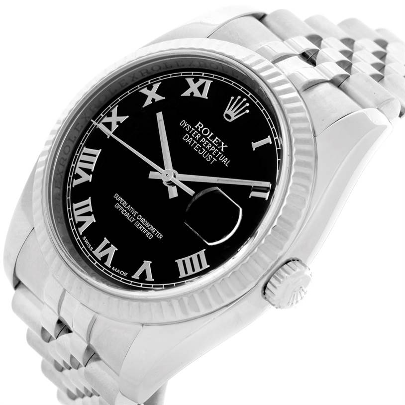 The image shows a close-up, tilted view of the Rolex Datejust 116234 Men
s Stainless Steel Black Dial 116234 Men
s Stainless Steel Black Dial, highlighting its black dial, Roman numerals, and part of the bracelet.