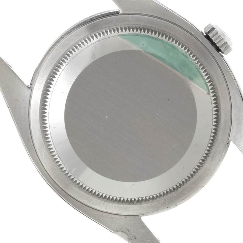 This image shows the back case and crown of the Rolex Datejust 116200 Men
s Stainless Steel White Dial 116200 Men
s Stainless Steel White Dial model watch from a rear angle.