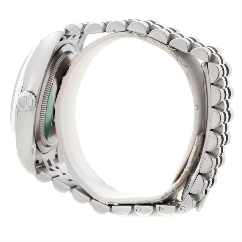 The image shows a side view of a Rolex Datejust 116200 Men
s Stainless Steel White Dial 116200 Men
s Stainless Steel White Dial watch, focusing on the case and bracelet links.