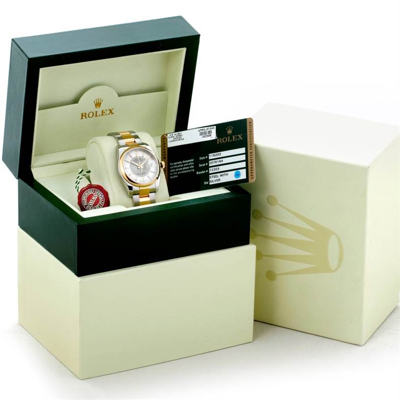 The Rolex Datejust 116203 Men's Stainless Steel Silver Dial 116203 Men's Stainless Steel Silver Dial watch is displayed in its open box, showing the watch, a tag, and a certification card.
