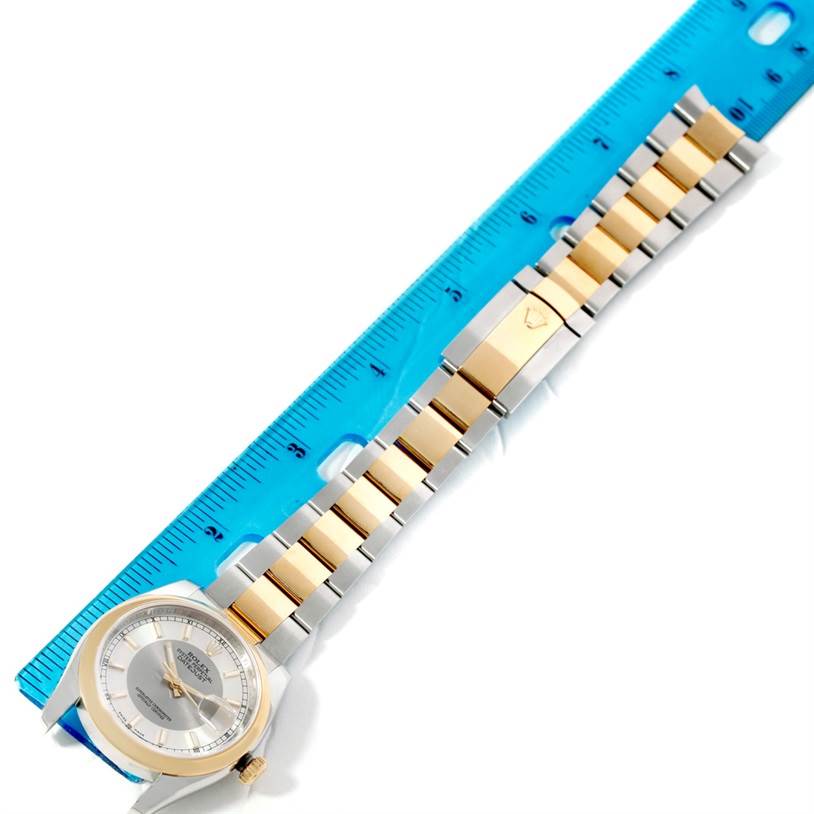 The image shows a Rolex Datejust 116203 Men's Stainless Steel Silver Dial 116203 Men's Stainless Steel Silver Dial watch laid flat, with a blue ruler measuring its length, displaying the dial and the full bracelet.