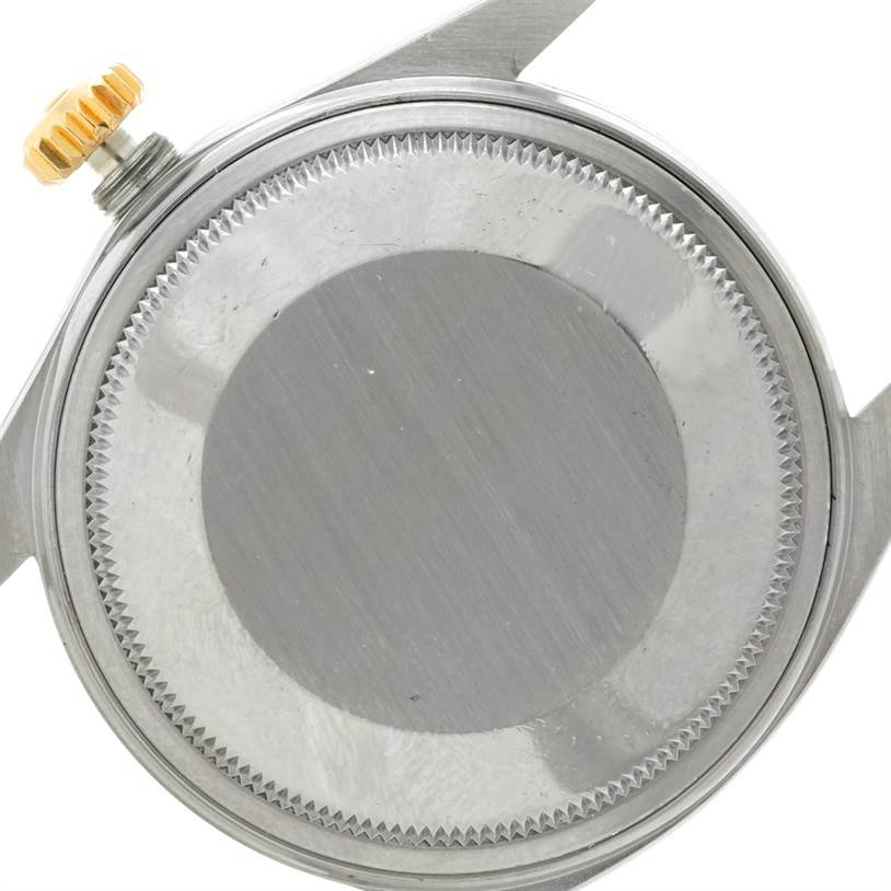 The image shows the backside view of a Rolex Datejust 16013 Men's Stainless Steel Champagne Dial 16013 Men's Stainless Steel Champagne Dial watch case, including the crown and case back.