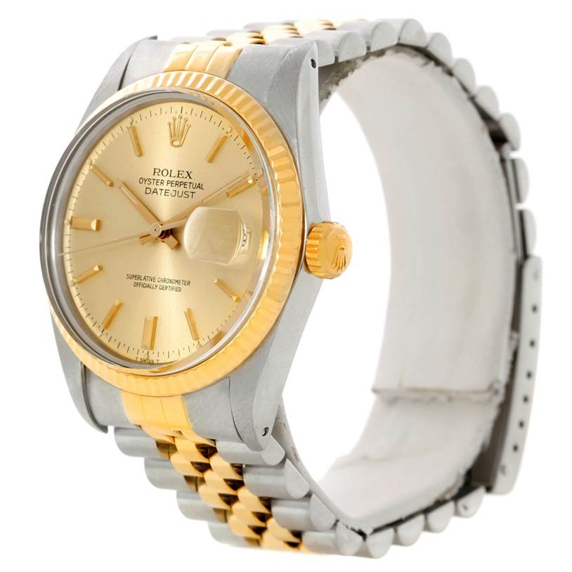 This image shows a side angle view of a Rolex Datejust 16013 Men's Stainless Steel Champagne Dial 16013 Men's Stainless Steel Champagne Dial watch, highlighting the dial, crown, bezel, and Jubilee bracelet.