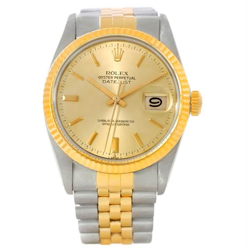 The Rolex Datejust 16013 Men's Stainless Steel Champagne Dial 16013 Men's Stainless Steel Champagne Dial watch is shown from a front angle, featuring a two-tone bracelet, fluted bezel, and champagne dial.