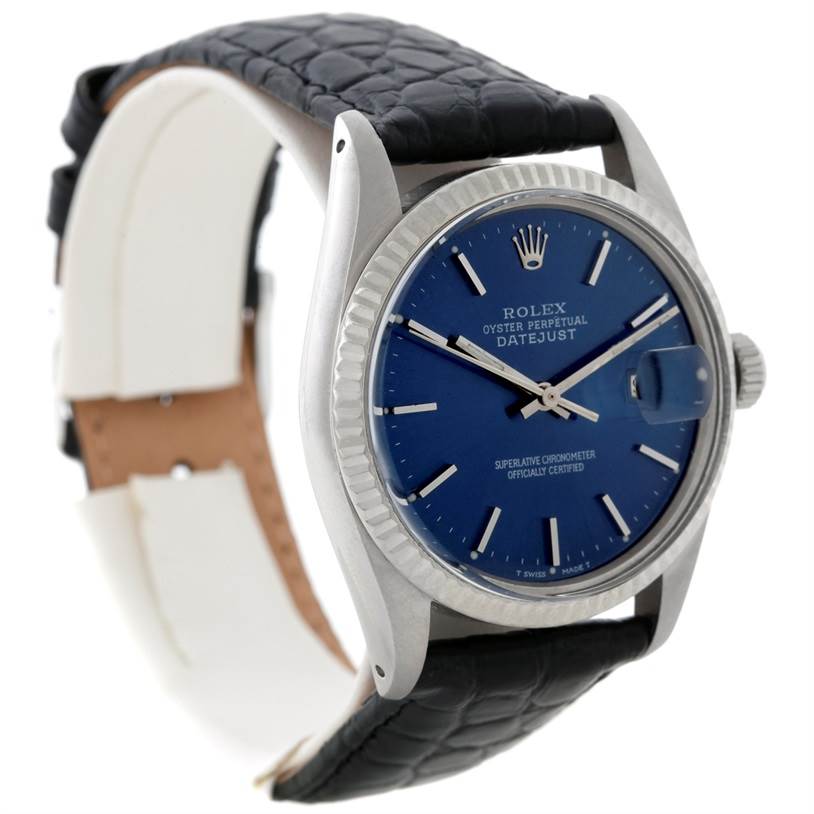 The Rolex Datejust 16014 Men's Stainless Steel Blue Dial 16014 Men's Stainless Steel Blue Dial watch is shown at a three-quarter angle, highlighting its blue dial, case, and black leather strap.