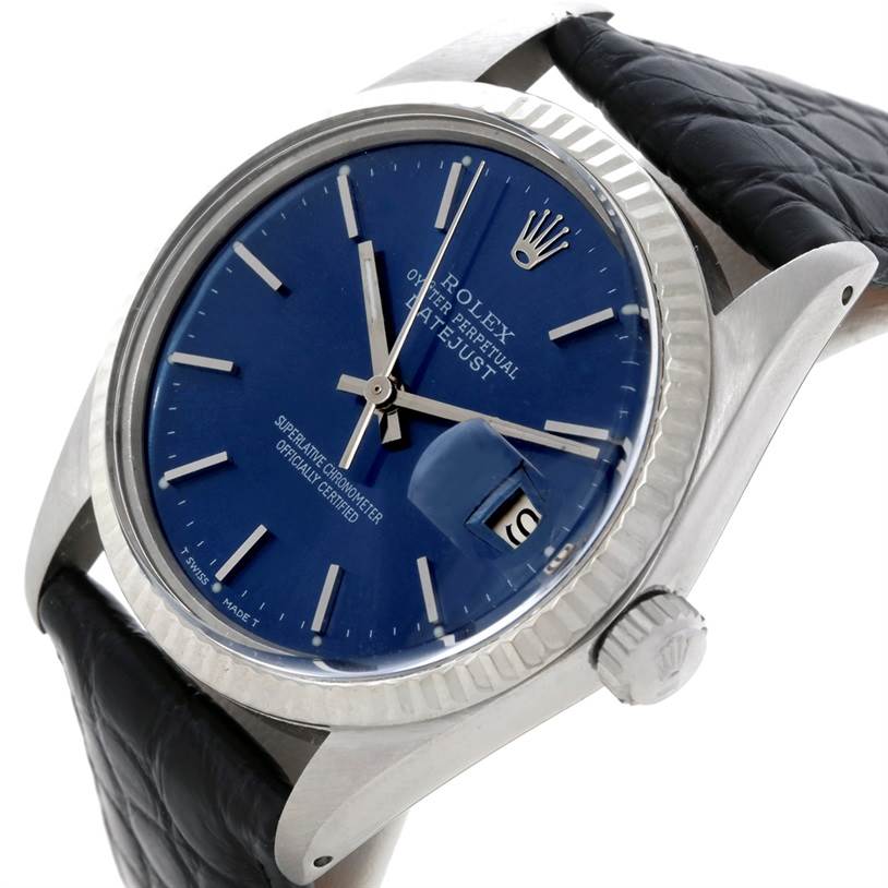 The Rolex Datejust 16014 Men's Stainless Steel Blue Dial 16014 Men's Stainless Steel Blue Dial model watch is shown at an oblique angle, highlighting the blue dial, fluted bezel, crown, and leather strap.
