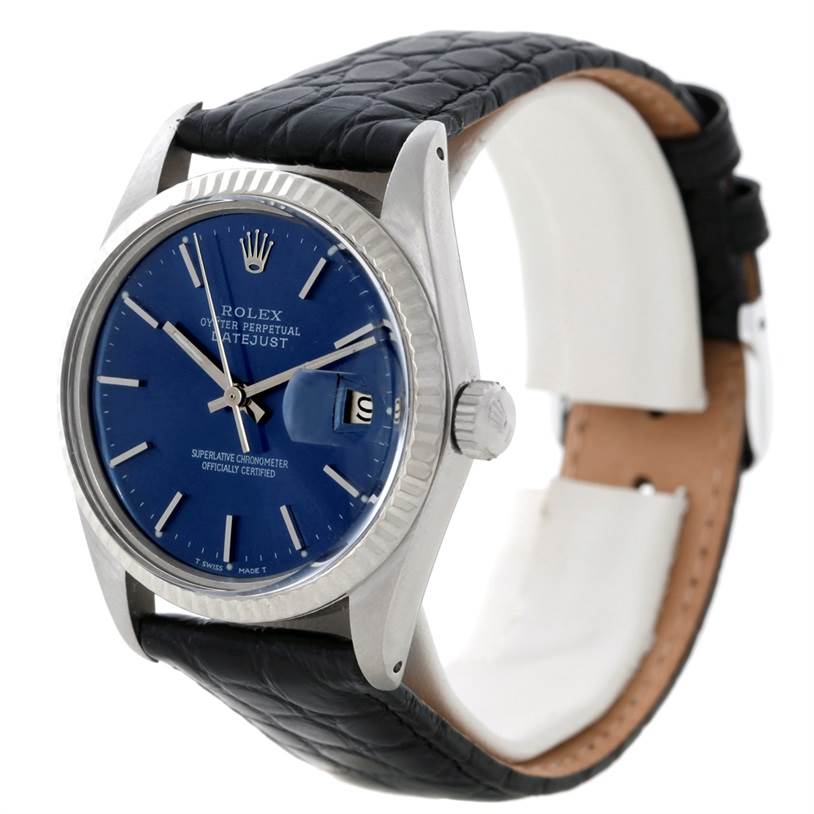 This image shows a side view of the Rolex Datejust 16014 Men's Stainless Steel Blue Dial 16014 Men's Stainless Steel Blue Dial watch, highlighting its blue dial, fluted bezel, crown, and black leather strap.