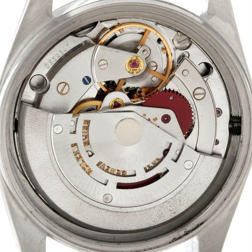 This image shows the inner mechanical movement of the Rolex Datejust 16014 Men's Stainless Steel Blue Dial 16014 Men's Stainless Steel Blue Dial watch, viewed from the back case.