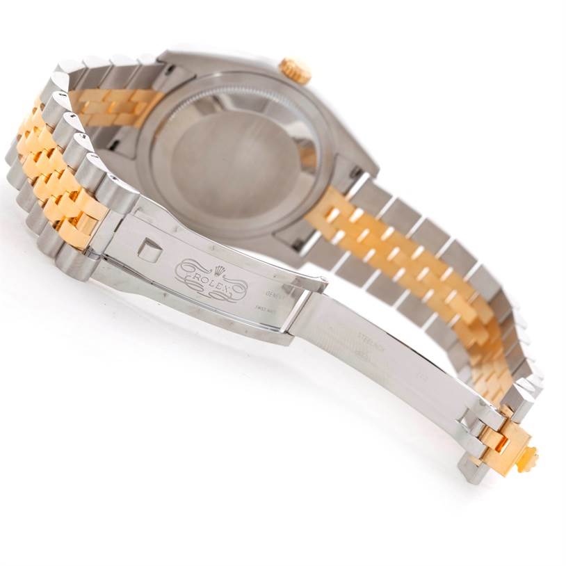 This image shows the back and clasp of a Rolex Datejust 116233 Men
s Stainless Steel Champagne Dial 116233 Men
s Stainless Steel Champagne Dial watch, emphasizing the two-tone metal bracelet.