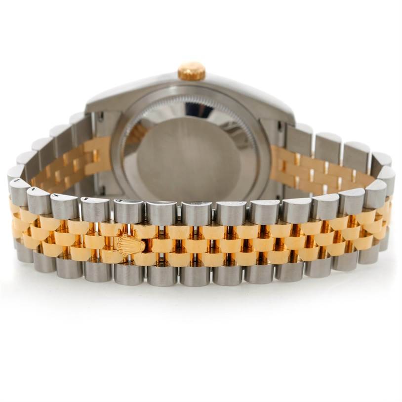 This image shows the back of a Rolex Datejust 116233 Men
s Stainless Steel Champagne Dial 116233 Men
s Stainless Steel Champagne Dial, highlighting its two-tone Jubilee bracelet and case back.
